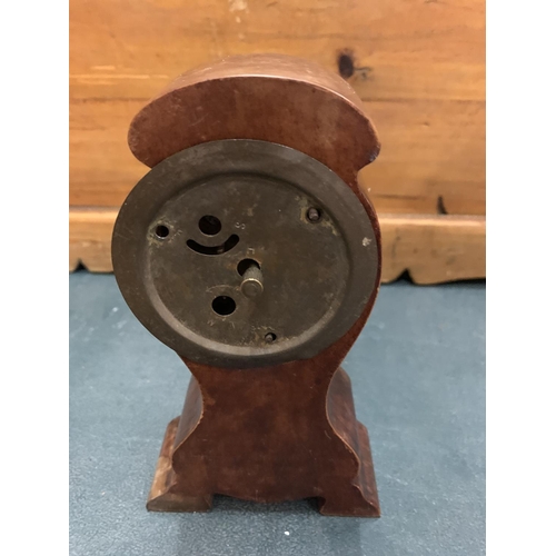 103 - A WOODEN INLAID MANTEL CLOCK