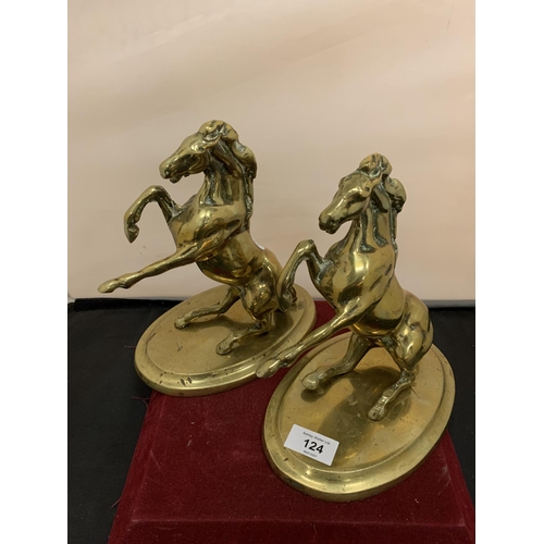 124 - A PAIR OF BRASS REARING HORSES ON PLINTHS