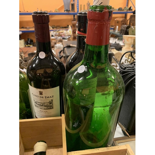 132 - AN ASSORTMENT OF LARGE VINTAGE WINE BOTTLES, SOME TO INCLUDE BATTERY POWERED LIGHTS