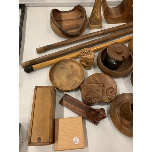 139 - AN ASSORTMENT OF TREEN TO INCLUDE A WINE RACK AND THREE WALKING STICKS ETC