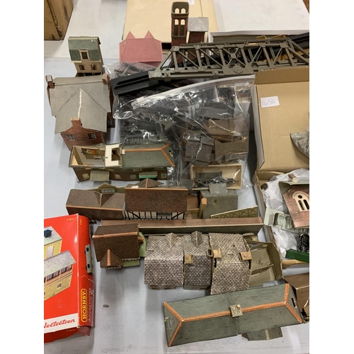 145A - A COLLECTION OF CARDBOARD AND PLASTIC MODEL TRAIN SET BUILDINGS AND BRIDGES ETC