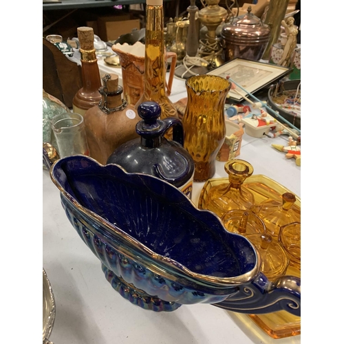 149 - AN ASSORTMENT OF POTTERY AND COLOURED GLASSWARE