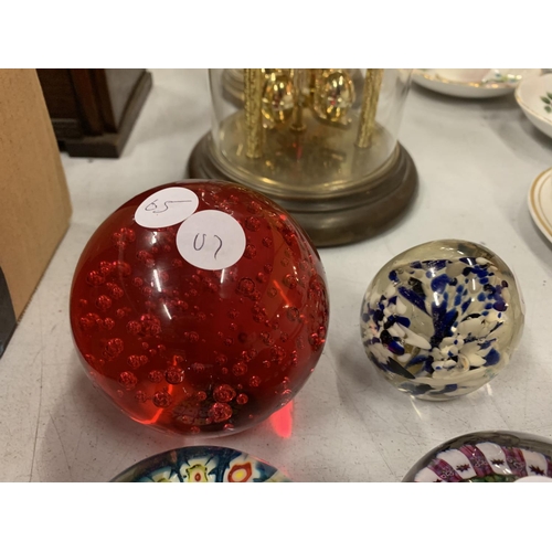 167 - SIX COLOURFUL GLASS PAPERWEIGHTS