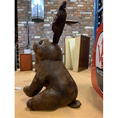 188 - A FAUX LEATHER RABBIT DOORSTOP