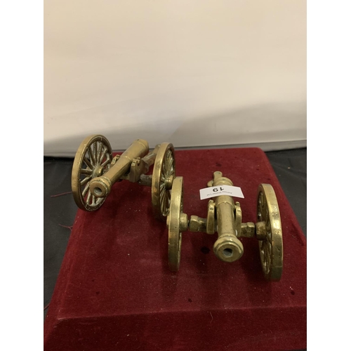 19 - A PAIR OF BRASS CANNONS