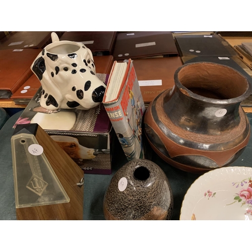 196 - AN ASSORTMENT TO INCLUDE A DECORATIVE DALMATION MUG AND A VINTAGE PHOTOGRAPHY BOOK