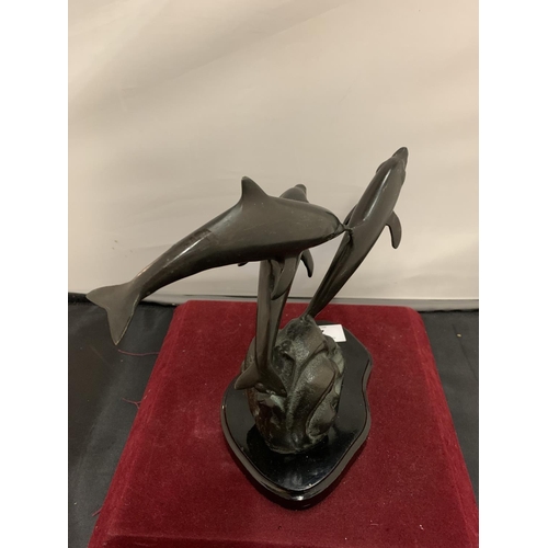 2 - A SPELTER ORNAMENT IN THE FORM OF THREE DOLPHINS