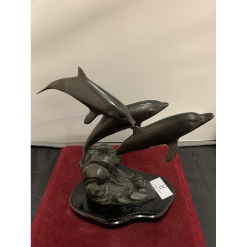 2 - A SPELTER ORNAMENT IN THE FORM OF THREE DOLPHINS