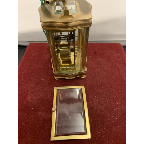 21 - A FRENCH BRASS FRAMED CARRIAGE CLOCK - WORKING WHEN CATALOGUED (DOOR A/F)