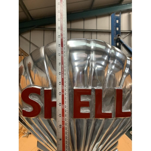 41 - A LARGE CHROME SHELL LOGO SIGN ON A PLINTH HEIGHT APPROXIMATELY 50CM