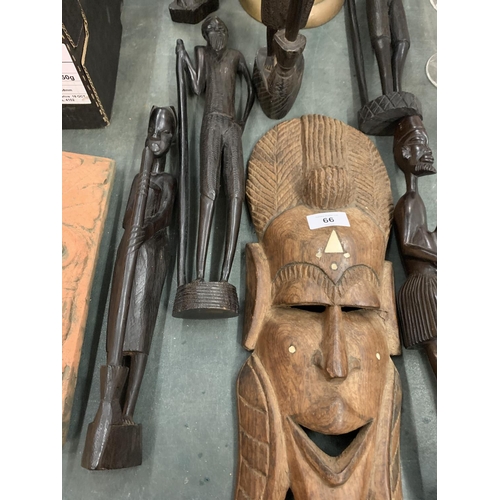 66 - AN ASSORTMENT OF TREEN TRIBAL FIGURES TO INCLUDE A FACE MASK