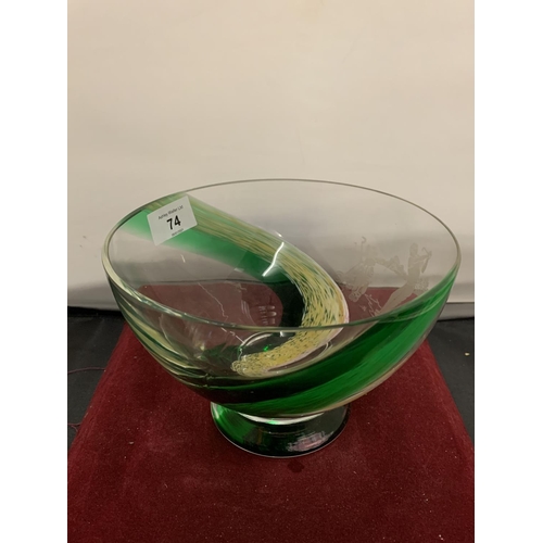 74 - A GREEN GLASS BOWL DEPICTING A GOLF MATCH