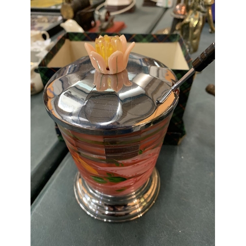 83 - A FLOWER PAINTED GLASS VASE WITH METAL BASE