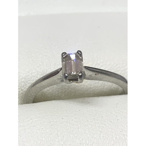 586 - A PLATINUM EMERALD CUT DIAMOND SOLITAIRE RING 0.43 CARAT CLARITY: VS1 COLOUR: K SIZE: O