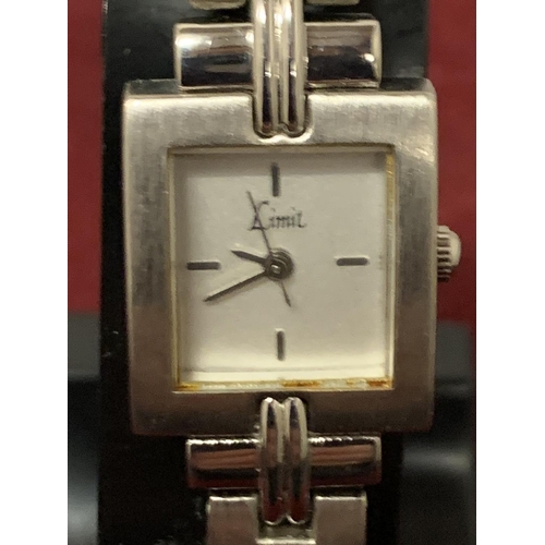 596 - A BOXED LADIES LIMIT WRIST WATCH