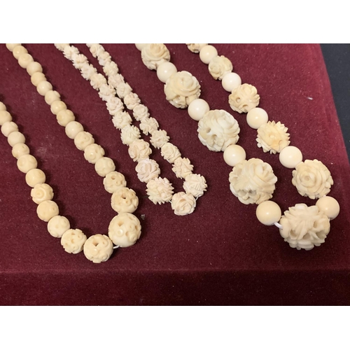 599 - ANTIQUE IVORY COLOURED CARVED ROSE BEADS NECKLACE, SINGLE GRADUATED STRAND 40 INCHES TOGETHER WITH T... 