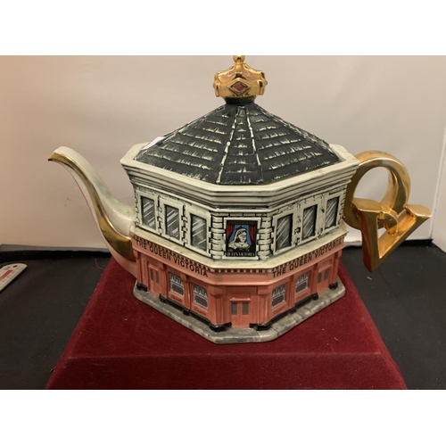 724 - A LARGE TEAPOT DEPICTING EASTENDERS QUEEN VIC (A/F HAIRLINE CRACK TO INSIDE OF LID)