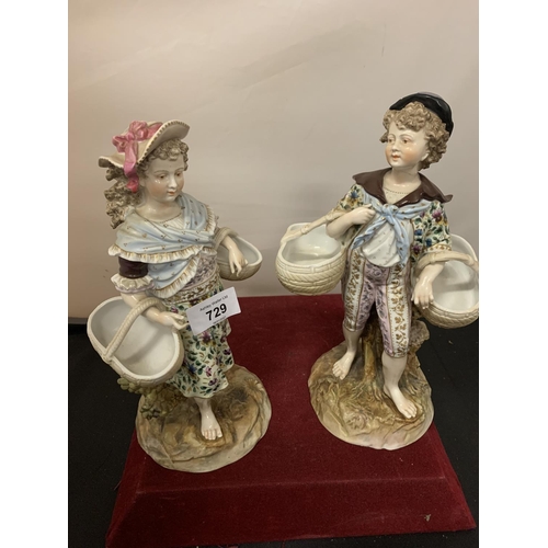 729 - TWO FIGURINES OF A BOY AND GIRL