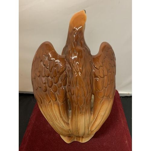 745 - A CERAMIC EAGLE ORNAMENT (A/F)