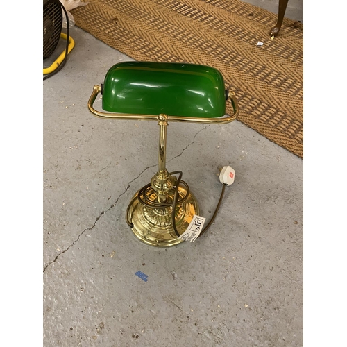 632 - A BRASS BANKERS LAMP WITH ANGLED GREEN GLASS SHADE