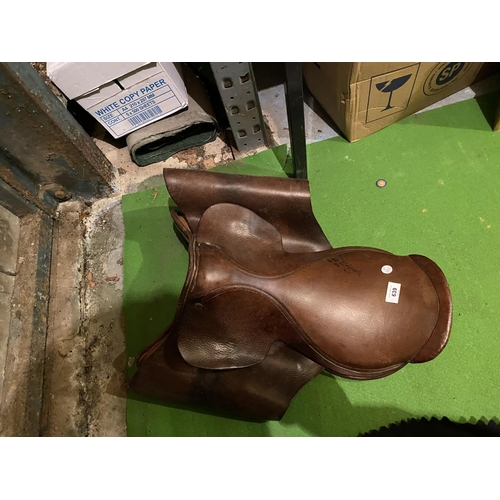 639 - A VINTAGE LEATHER SADDLE