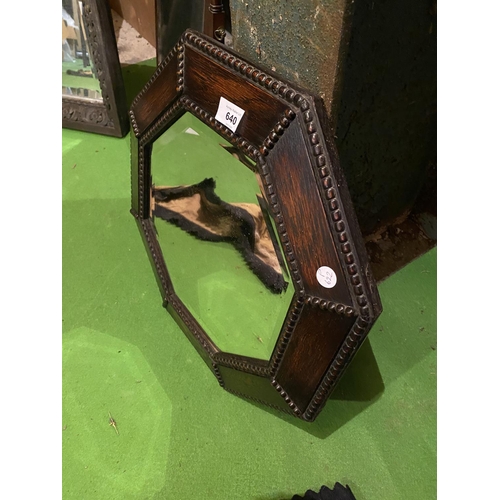 640 - A VINTAGE OCTAGONAL WOODEN FRAMED BEVEL EDGED WALL MIRROR WITH BEAD DETAIL