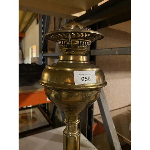 656 - A LARGE BRASS OIL LAMP WITH GLASS FUNNEL (HEIGHT APPROXIMATELY 76 CM)