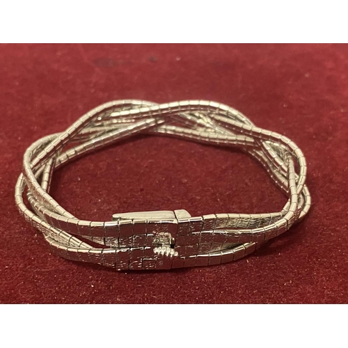 503 - A SILVER TWISTED STYLE BRACELET