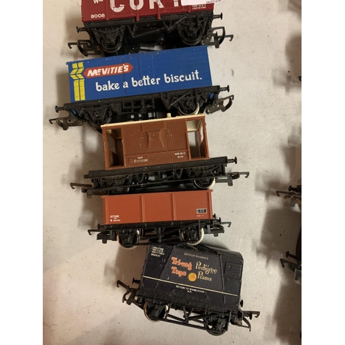 234 - SEVEN OO GAUGE FREIGHT CARRIAGES TO INCLUDE A MCVITIES TRAILER AND A SCARWOOD COAL TRAILER ETC