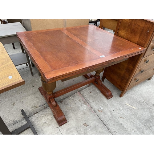 2343 - AN OAK DRAW LEAF TABLE