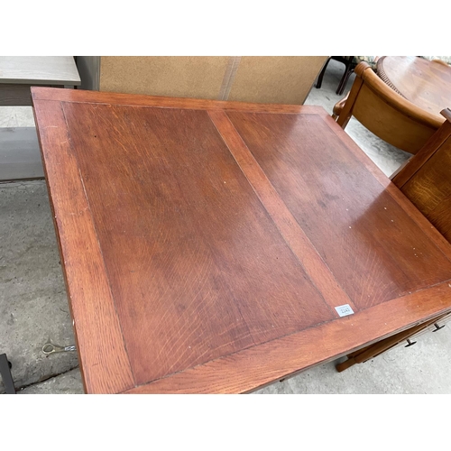 2343 - AN OAK DRAW LEAF TABLE