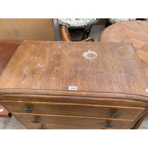 2344 - AN OAK CHEST OF FIVE DRAWERS