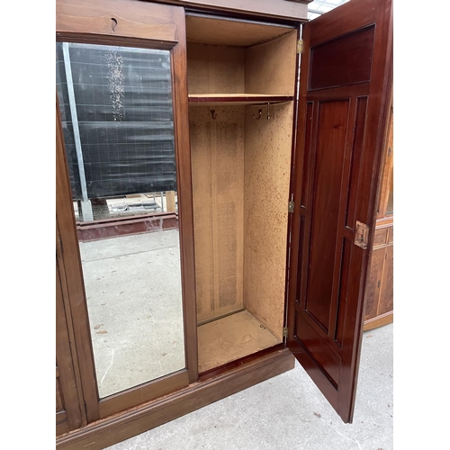 2345 - A LATE VICTORIAN MAHOGANY MIRROR DOOR WARDROBE WITH HANGING COMPARTMENT,DRAWERS ANS SLIDES 79 INCHES... 