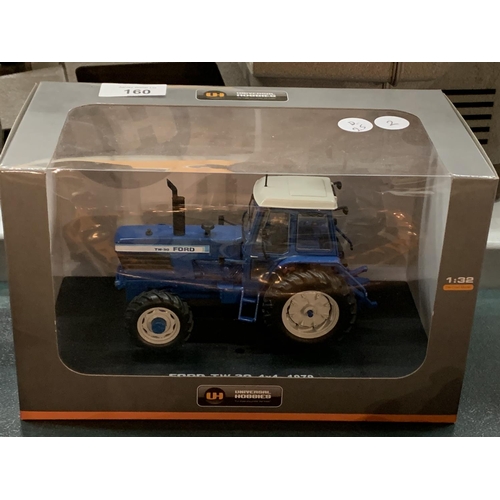 160 - A BOXED UNIVERSAL HOBBIES DIE CAST FORD TRACTOR 1:32