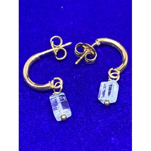 510 - A PAIR OF 9 CARAT GOLD EARRINGS MARKED 375 WITH  CLEAR STONE CUBOIDS IN A PRESENTATION BOX