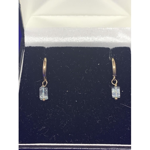 510 - A PAIR OF 9 CARAT GOLD EARRINGS MARKED 375 WITH  CLEAR STONE CUBOIDS IN A PRESENTATION BOX