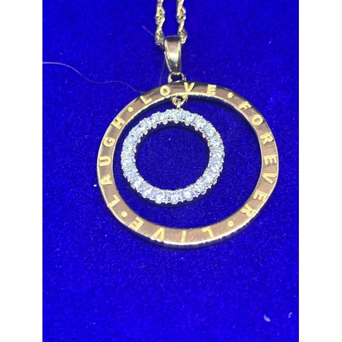 516 - A SILVER GILT NECKLACE MARKED 925 WITH A CIRCULAR PENDANT ENGRAVED LIVE LAUGH LOVE FOREVER AND A FUR... 