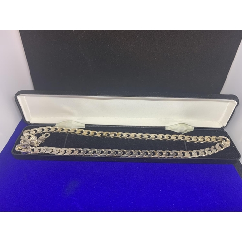 518 - A HEAVY SILVER NECKLACE WITH A FLAT CURB DESIGN MARKED 925 IN A PRESENTATION BOX APPROXIMATELY 51CM ... 