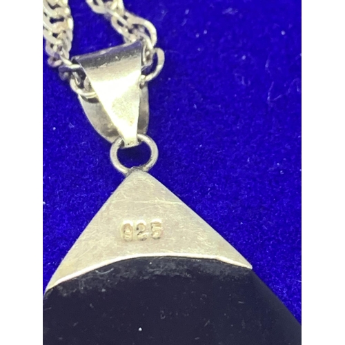 519 - A SILVER CHAIN AND PENDANT MARKED 925 WITH A PEARLISED TEARDROP DESIGN