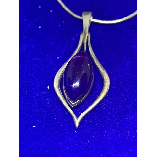 523 - A SILVER NECKLACE WITH PENDANT MARKED 925 WITH A PURPLE STONE WITH A PRESENTATION BOX