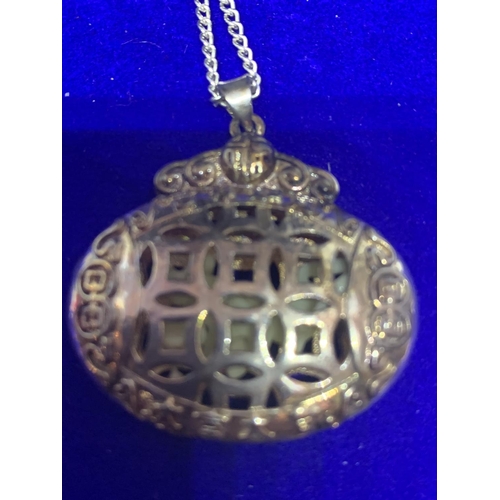 529 - A SILVER CHAIN MARKED STERLING AND AN ORNATE DOUBLE SIDED PENDANT WITH A PRESENTATION BOX