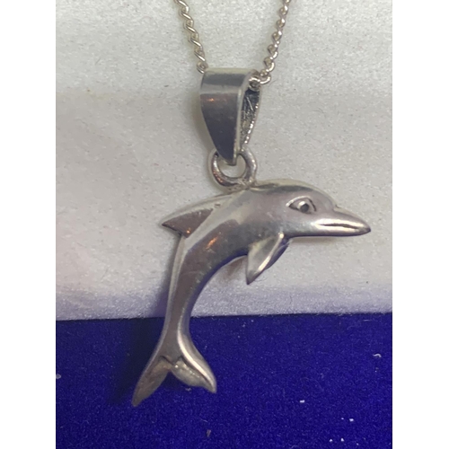 541 - A SILVER NECKLACE WITH A DOLPHIN PENDANT MARKED 925 IN A PRESENTATION BOX