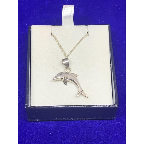 541 - A SILVER NECKLACE WITH A DOLPHIN PENDANT MARKED 925 IN A PRESENTATION BOX