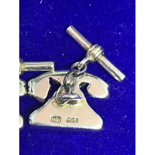 551 - A PAIR OF HALLMARKED SILVER TELEPHONE STYLE CUFF LINKS IN A PRESENTATION BOX