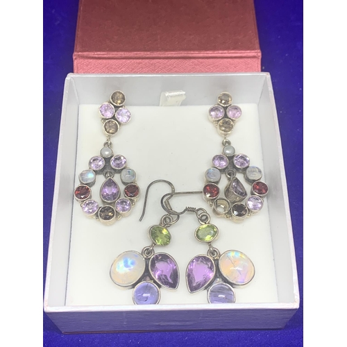 576 - TWO PAIRS OF SILVER DROP EARRINGS WITH COLOURED STONES MARKED 925 (A STONE MISSING FROM ONE EARRING)... 