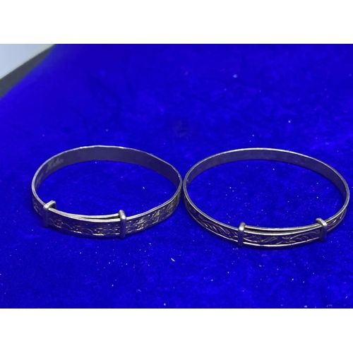 578 - FIVE VARIOUS SIZED SILVER BANGLES