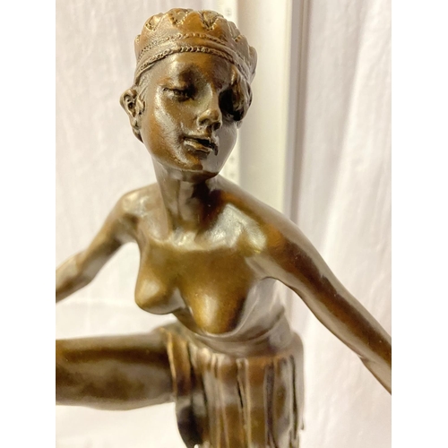 15 - A BRONZE FIGURINE IN THE FORM OF AN ART DECO DANCER ON A MARBLE BASE SIGNED D ALONZO HEIGHT 49CM