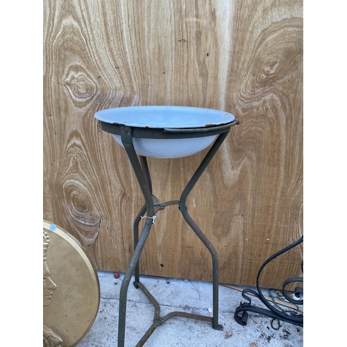 1212 - A VINTAGE ENAMEL WASH BASIN ON A WROUGHT IRON STAND