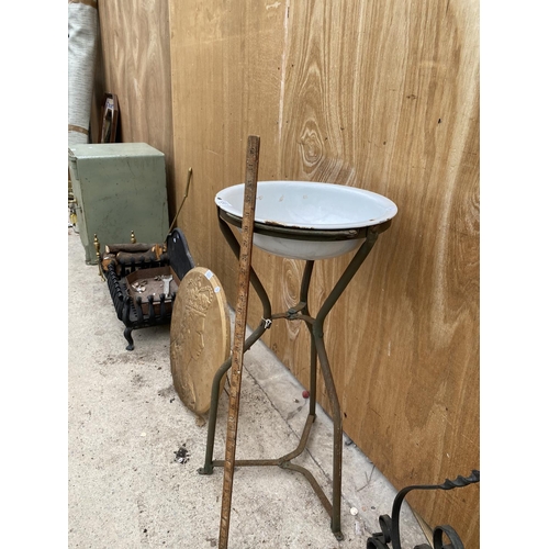 1212 - A VINTAGE ENAMEL WASH BASIN ON A WROUGHT IRON STAND