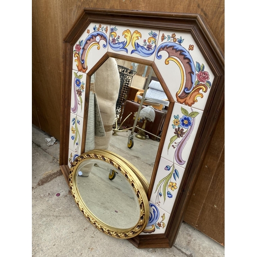 1218 - A PAIR OF MIRRORS TO INCLUDE A LARGE WOODEN TILE MIRROR AND A BEVELED GILT OVAL MIRROR